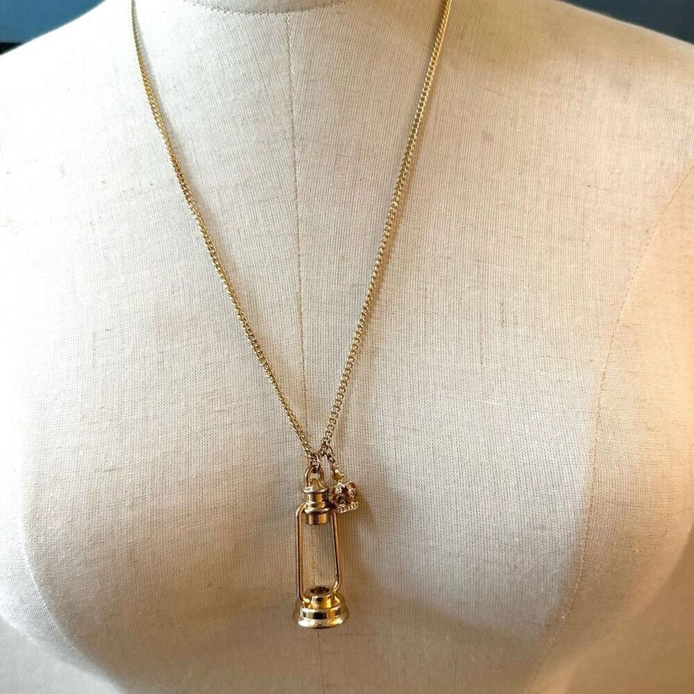 Gold tone lantern and crown vintage charm necklace